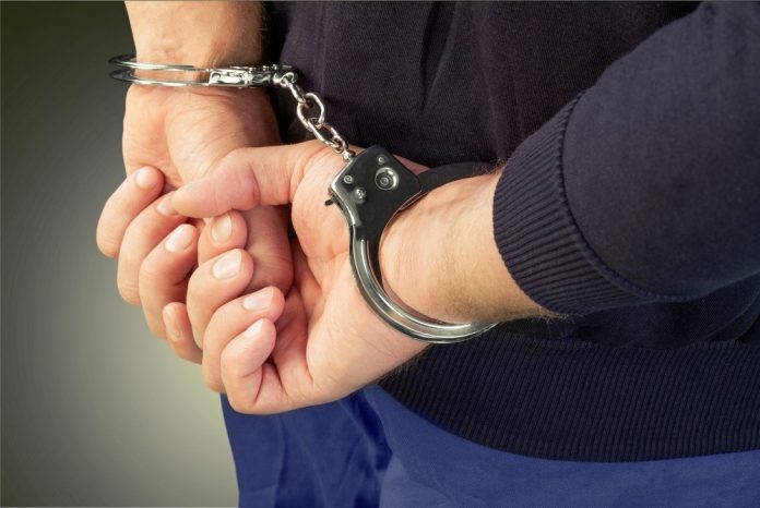 handboeien poliite dief _Door Billion Photos_shutterstock_311264501