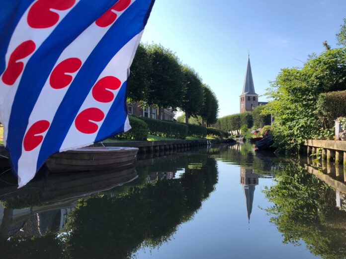 Canal,In,Ijlst,With,A,Frisian,Flag,In,Friesland,The