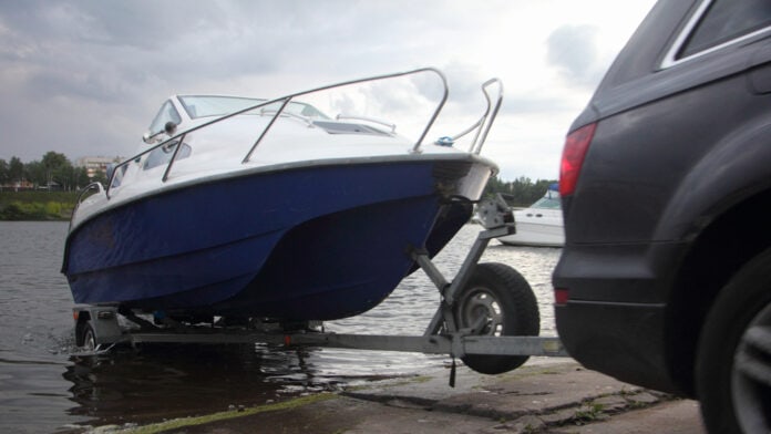 A,4x4,Black,Car,Pulls,Blue-white,Trimaran,Cabin,Motor,Boat