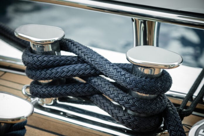 Mooring,Lines,Wrapped,Around,A,Big,Stainless,Steel,Cleat,Of