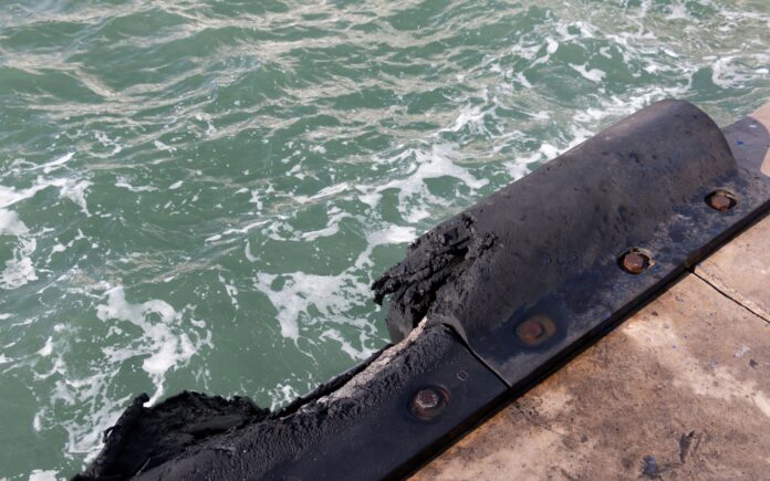 Damaged,Rubber,Fender,At,The,Dock